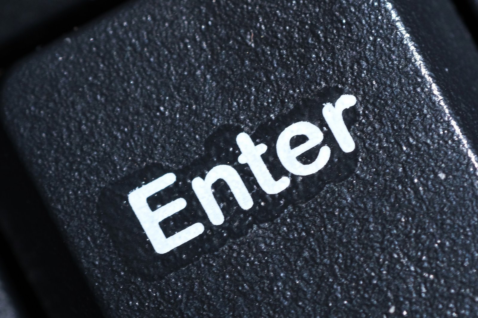 Nahaufnahme der Enter-Taste einer Tastatur